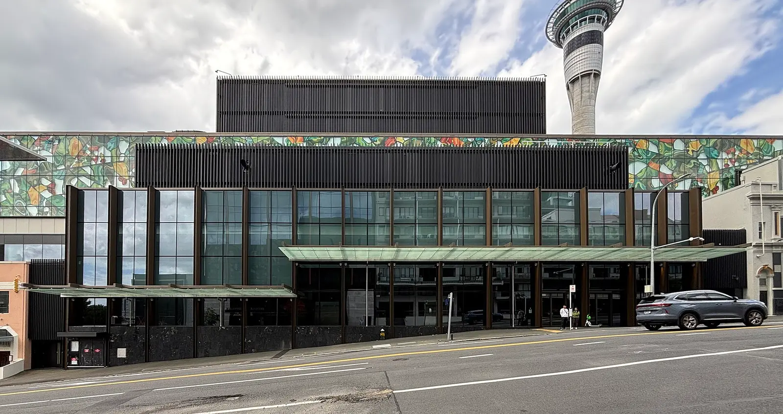 The NZ International Convention Centre frontage with the Sky Tower behind
