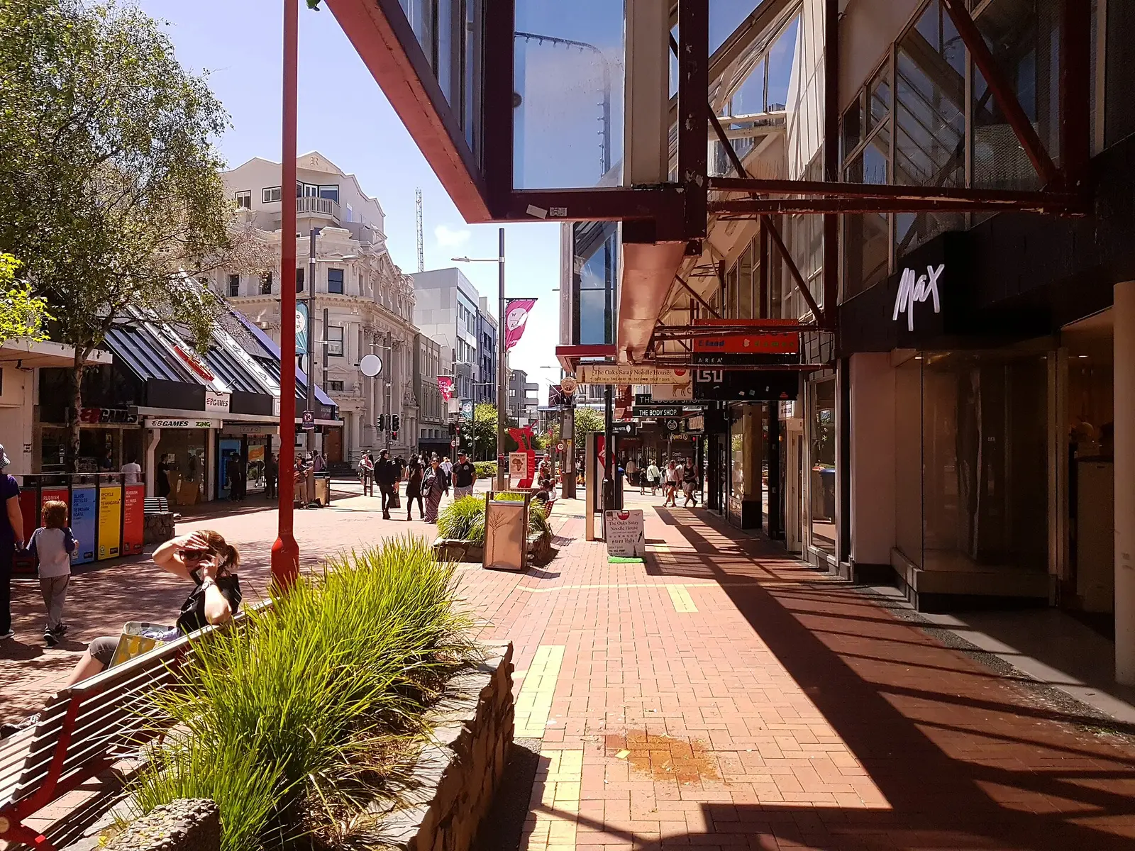 Pedestrians and shopfronts on lower Cuba Street in central Wellington